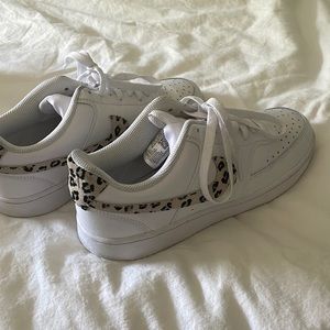 White and cheetah Nikes